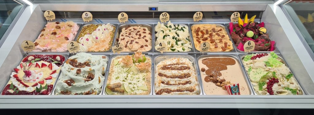 All 12 competition flavours decorated in the display case