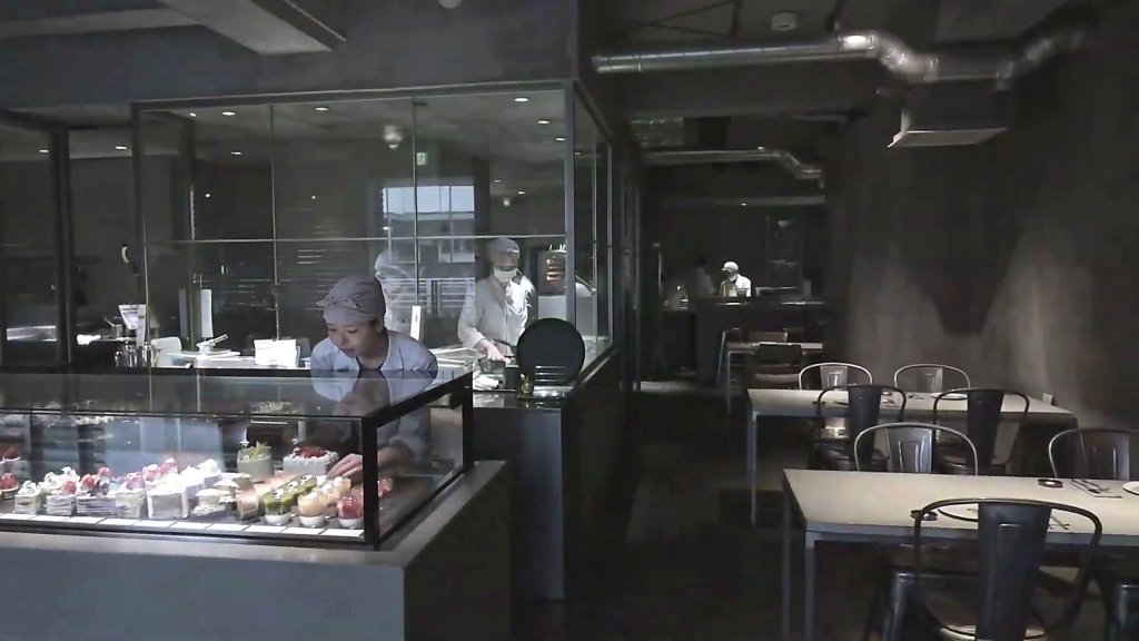 Second shop with a glass-walled kitchen