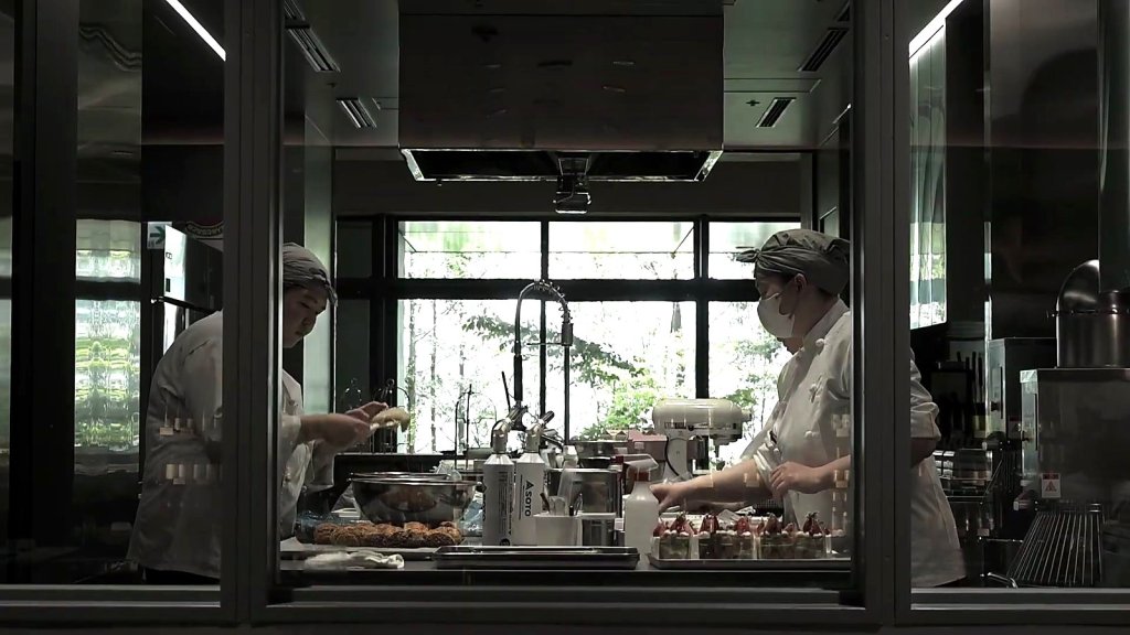Open kitchen with staff at work