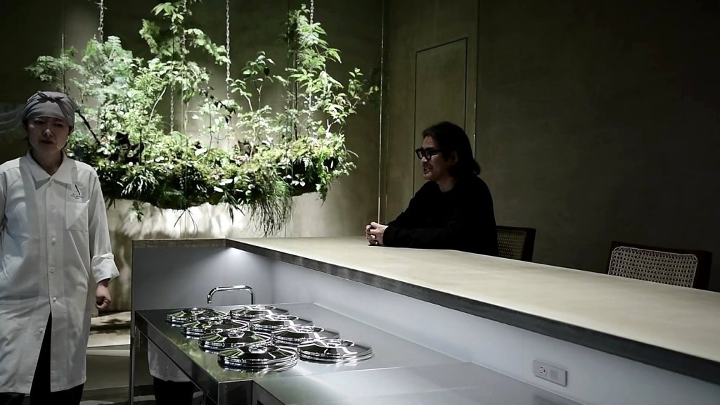 Asako Iwayanagi behind the gelato counter with creative director Takumi Shukuzawa