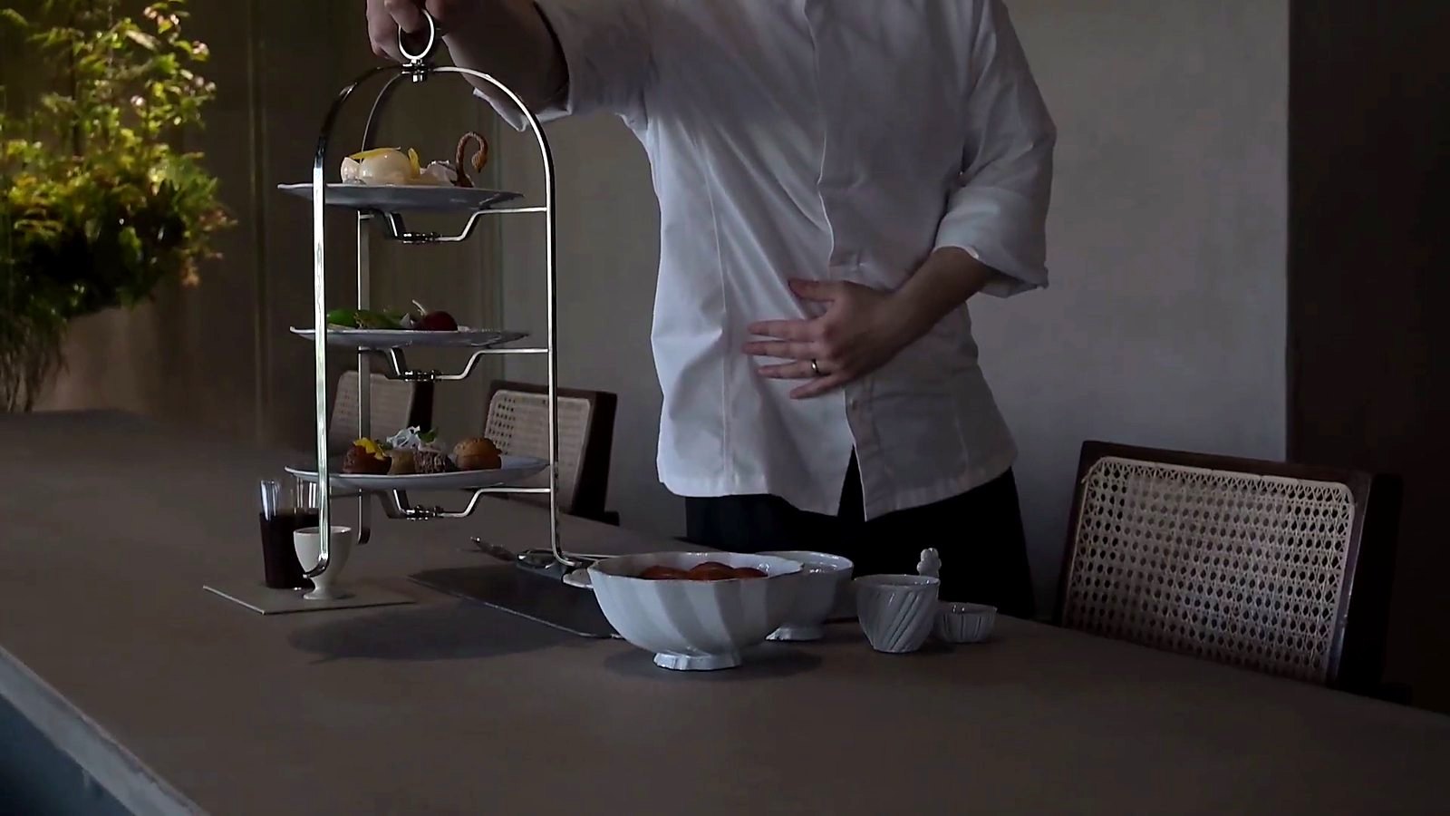 Afternoon tea on a tiered stand.