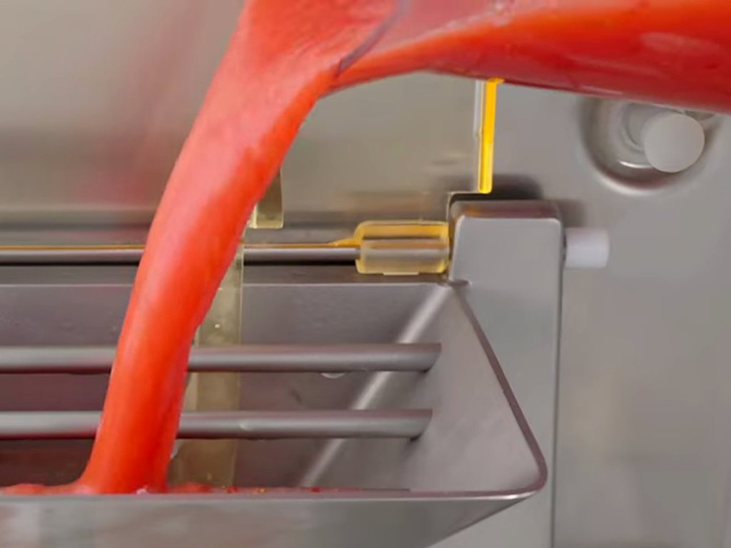 Strawberry mix poured into a Carpigiani batch freezer