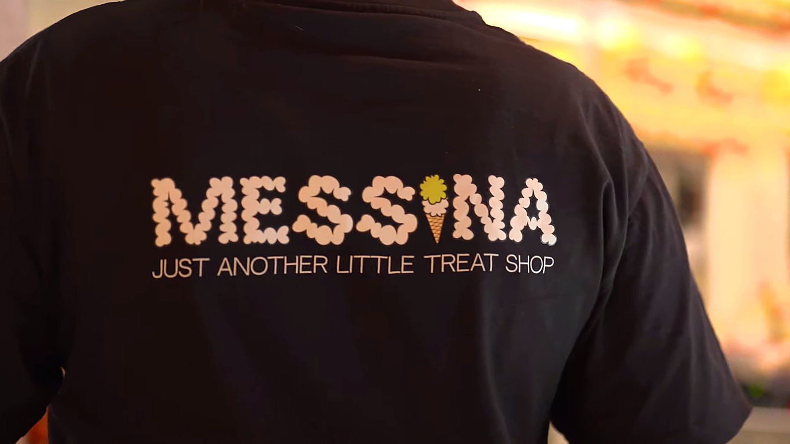 Just another little treat shop, says the staff tee.