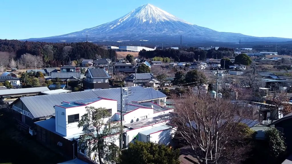 Aerial view of the town and IDEBOK buildings below Mount Fuji