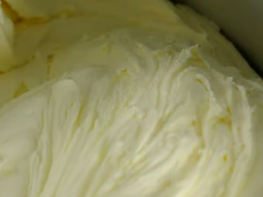 Freshly made gelato ready to scoop from the cylinder