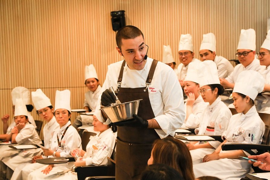 Fiorani demonstrating a dessert technique