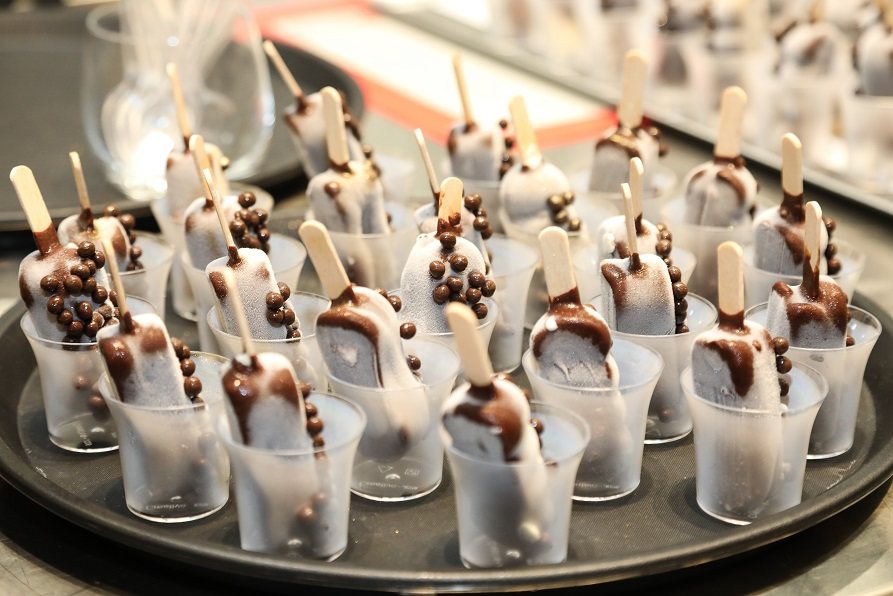 Students watching a gelato dessert demonstration