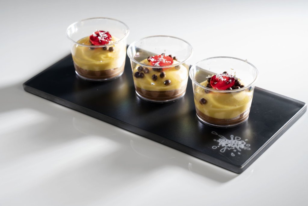 Fabrizio Fiorani plating a dessert at Carpigiani Gelato University