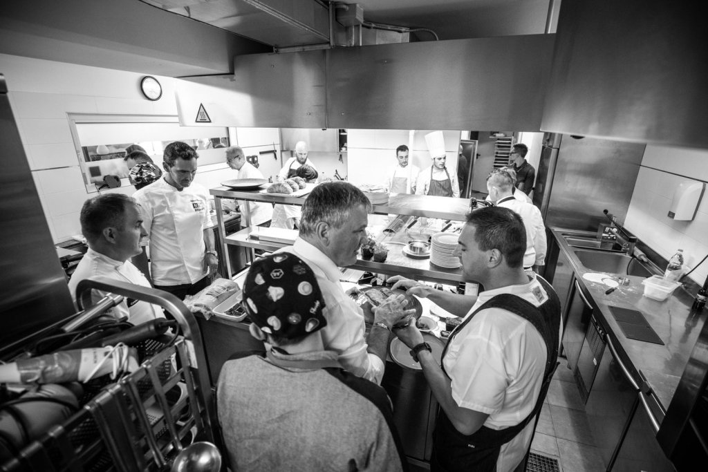 Chefs cooking together at the CHIC event in Bolzano