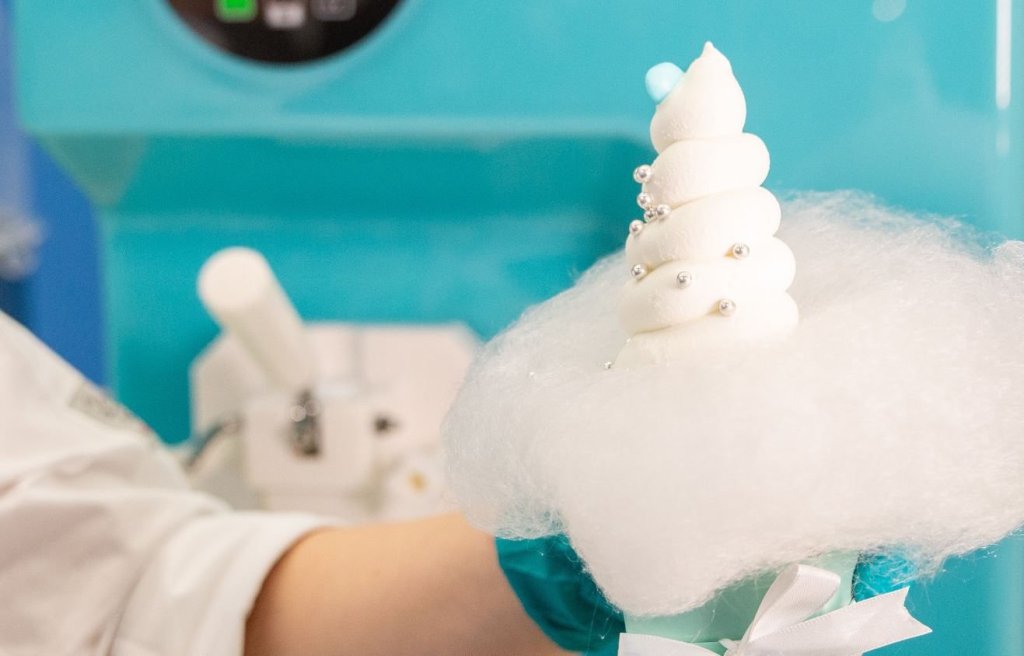 Jewel soft serve concept served in a gift box with cotton candy